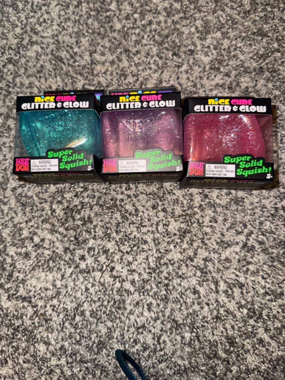 3 Needoh Nice Cube Glitter & Glow Squish Trio - Teal, Purple, Pink